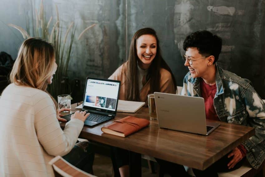 Group of people at work talking and listening