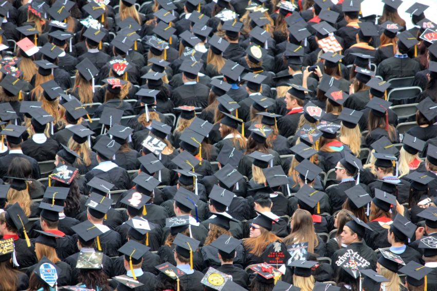 Diversity group of students graduating successfully