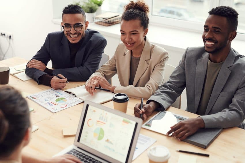 Three business people at a desk