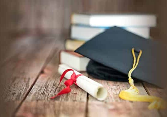 Toga hat with diploma