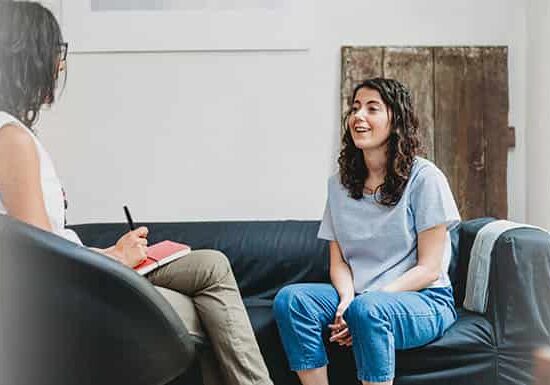 Professor talking interview to student