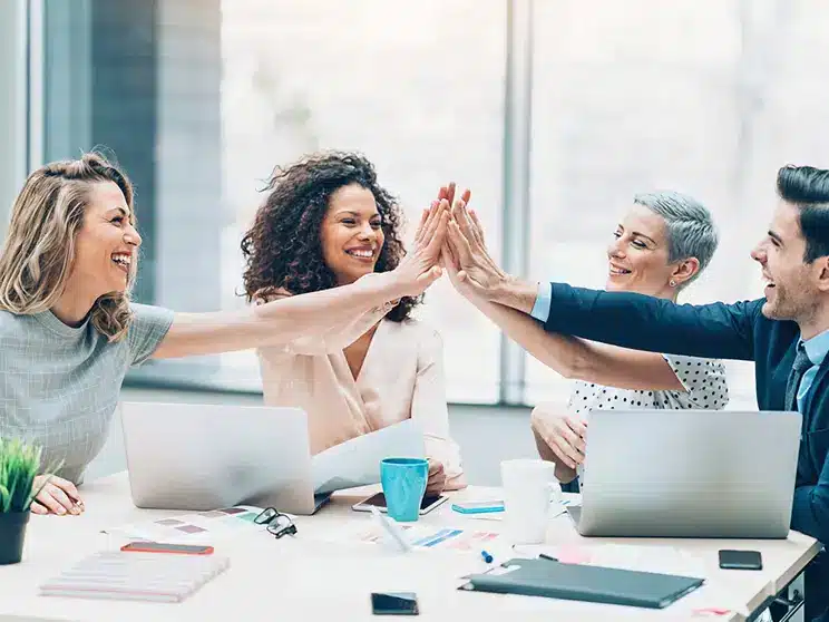 cheerful employees at the workplace